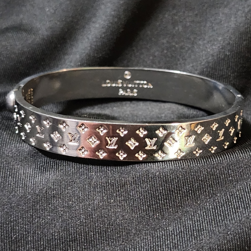 Louis Vuitton nanogram cuff bracelet (silver).